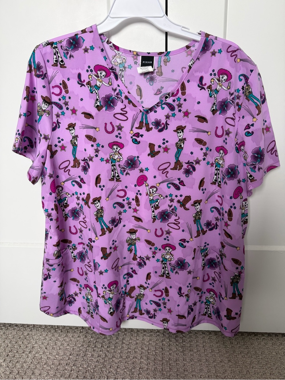 Pixar women’s scrub top